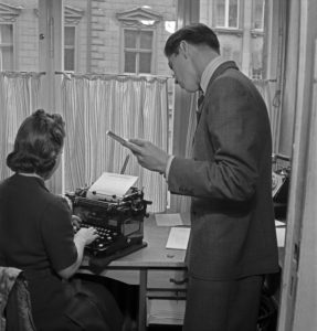 Apprentice doing administrational work at the office, Germany 1940s. Apprentice doing administrational work at the office, Germany 1940s.
